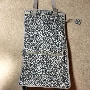 Cheetah print wheeled tote.